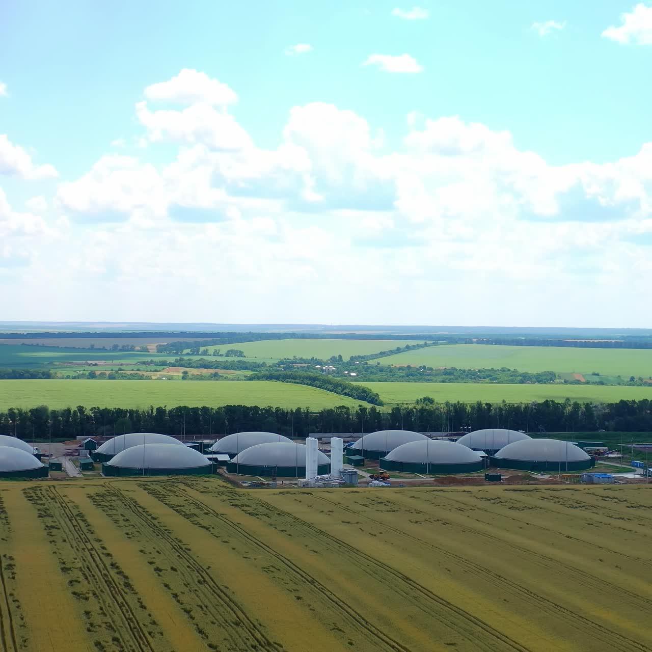 Static camera view of the distillation process is used to produce bio gas at station. View from above