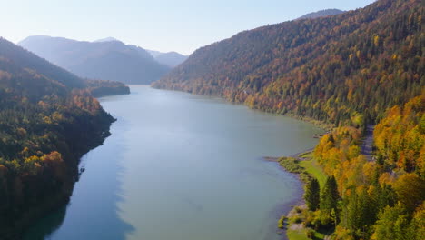 sunrise shining over isar river aerial view between faller-klamm-brücke autumnal alpine mountain range