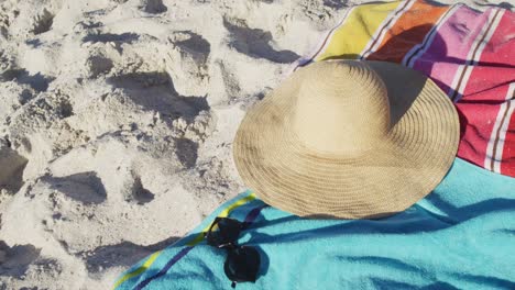 video of beach equipment lying on sand on beach