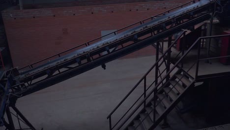 industrial conveyor belt in a factory setting