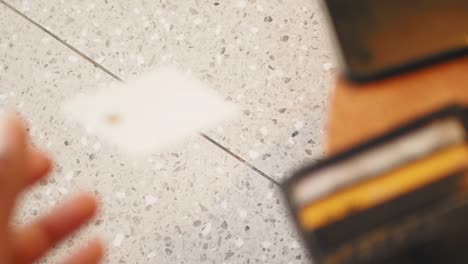 close-up of a credit card lying on the floor