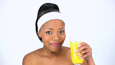 attractive woman drinking orange juice