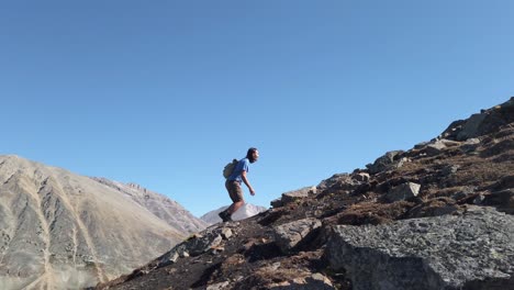 hiker ascending uphill walking circling crab close up kananaskis alberta canada