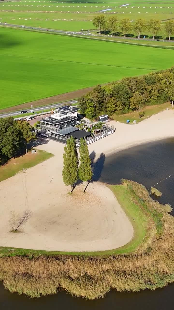 Restaurant NU near a lake