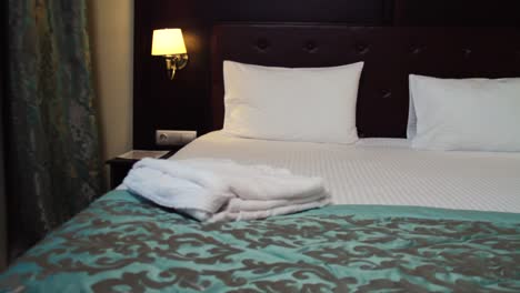 hotel room bedroom with bathrobes