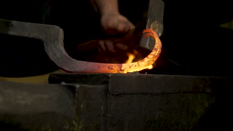 blacksmith metal forging in 120fps slow motion