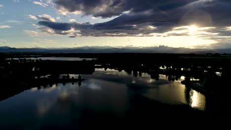 glorious mountain sunset with reflections in lakes and ponds