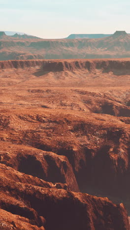 stunning aerial view of a vast, red desert canyon