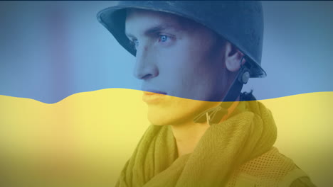 animation of flag of ukraine over caucasian male soldier with weapon