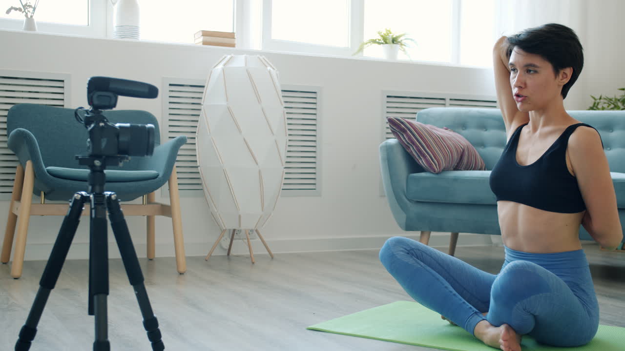 Woman Doing Yoga Online Exercise Video Tutorial