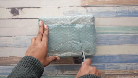 unboxing a package with bubble wrap