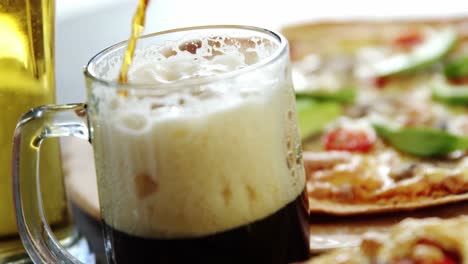 soft drink being poured into glass