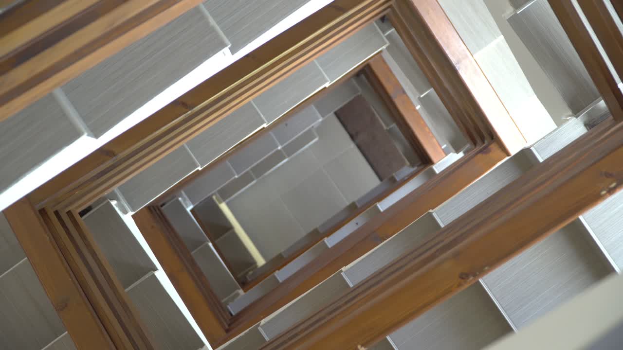 Modern loft interior of entrance in multi-store apartment building. Brick wall.
