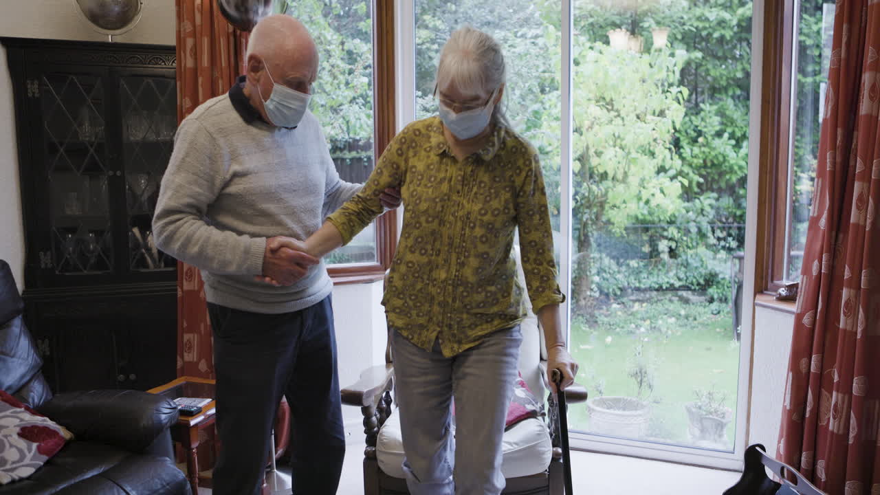 Elderly couple receiving assistance at home