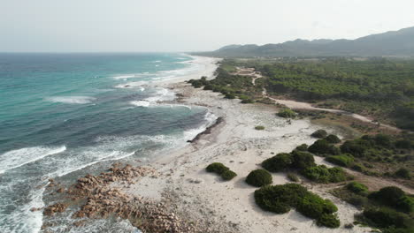 Aerial-view-drone-over-beach-sea-with-powerful-sea-waves