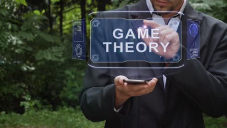 el hombre de negocios usa el holograma con la teoría del juego de texto