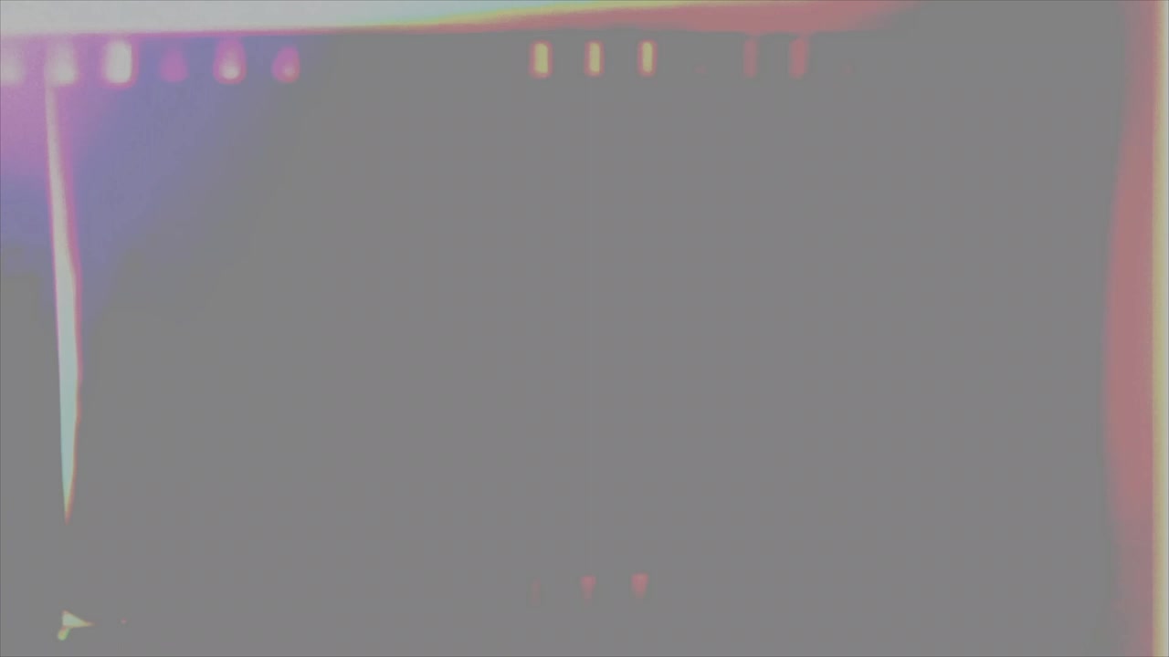 Vintage Film Reel Overlay with Light Leaks and Sprocket Holes