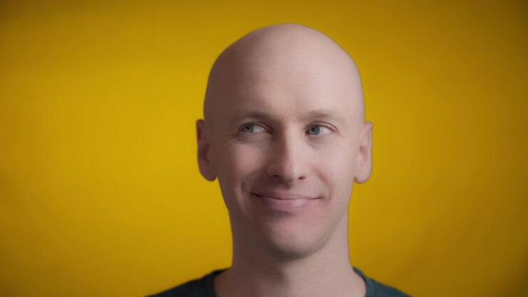 Man giving a smirk to the side