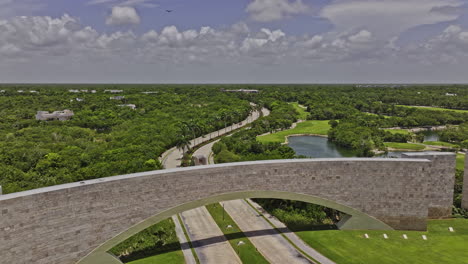 Akumal-Mexico-Drone-Aéreo-V18-Sobrevolando-La-Entrada-Del-Campo-De-Golf-Capturando-El-Exuberante-Paisaje-De-La-Jungla-Maya,-Lagos-Naturales-Y-Cenotes---Filmado-Con-Mavic-3-Pro-Cine---Julio-De-2023