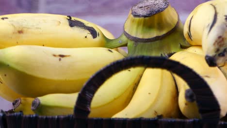 bunch of bananas in a basket