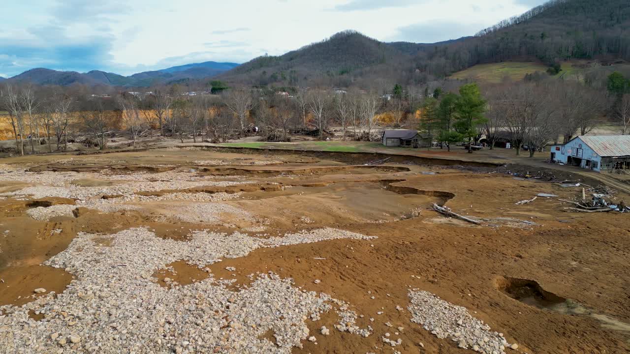 4K Aerial Drone Video of Erosion and Debris Around Barn and Cabin Caused by Flooding of Nolichucky River in Erwin, TN after Hurricane Helene (2024)