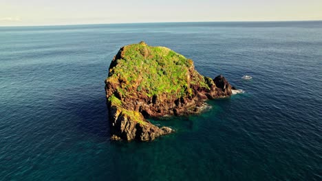small volcanic island in the ocean
