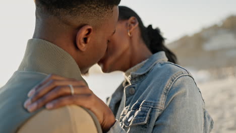 Black-couple,-ocean-and-kiss-closeup-with-love