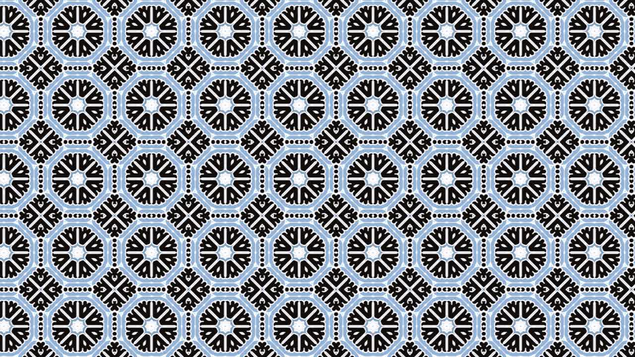 Abstract seamless pattern animation of repeating round ornaments isolated on black background