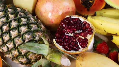 variety of fruits displayed on a white background