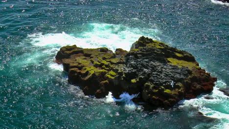 slow motion footage of sea waves on coast line with cliffs and rocks in arnarstapi village in iceland on snaefellsnes peninsula