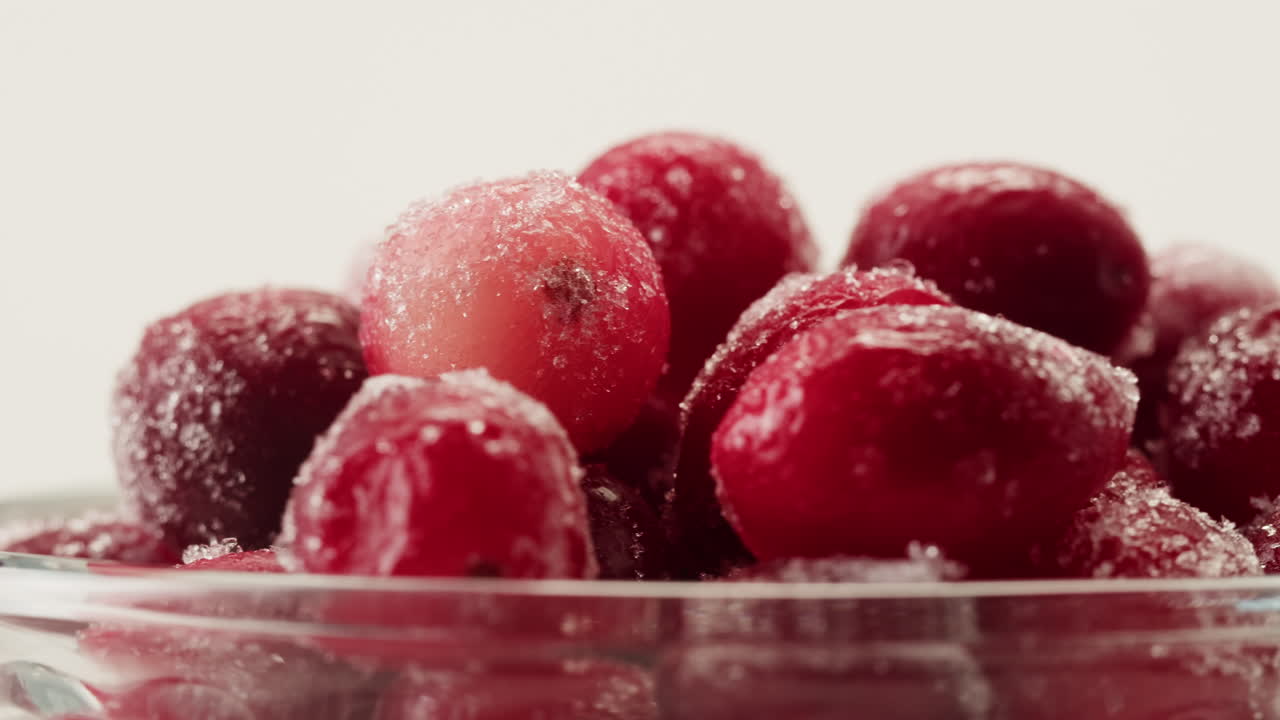 Frozen cranberries cooking for tea or jam, Background Close up of cranberry berries in on the kitchen, chef making dessert healthy pie.