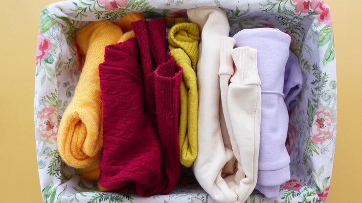Folded Clothes in a Floral Basket