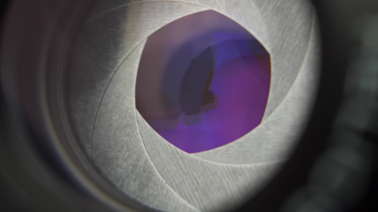 Camera Lens Aperture Diaphragm Iris Opening And Closing when Taking Pictures