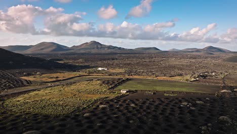 stunning drone flight over lanzarote's wine-growing region la geria with unique volcanic landscape