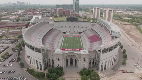 aerial footage of ohio state university ohio stadium reveal moving up