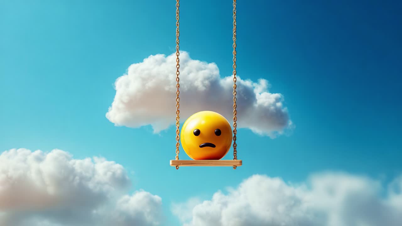 A yellow sad smiley face sits on a wooden swing, suspended in a bright blue sky adorned with fluffy clouds, symbolizing emotions and introspection in a whimsical scene