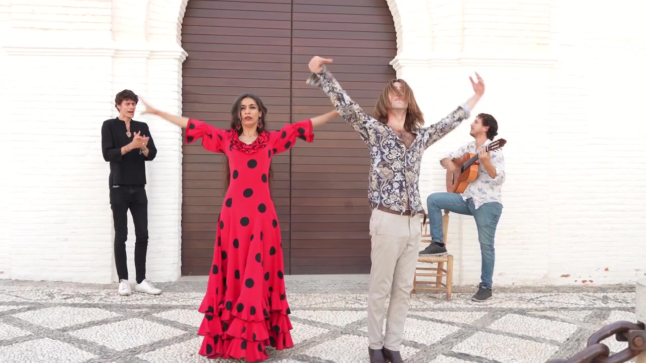 Multiethnic group of flamenco dancers dancing for tourists in san nicolas albaicin