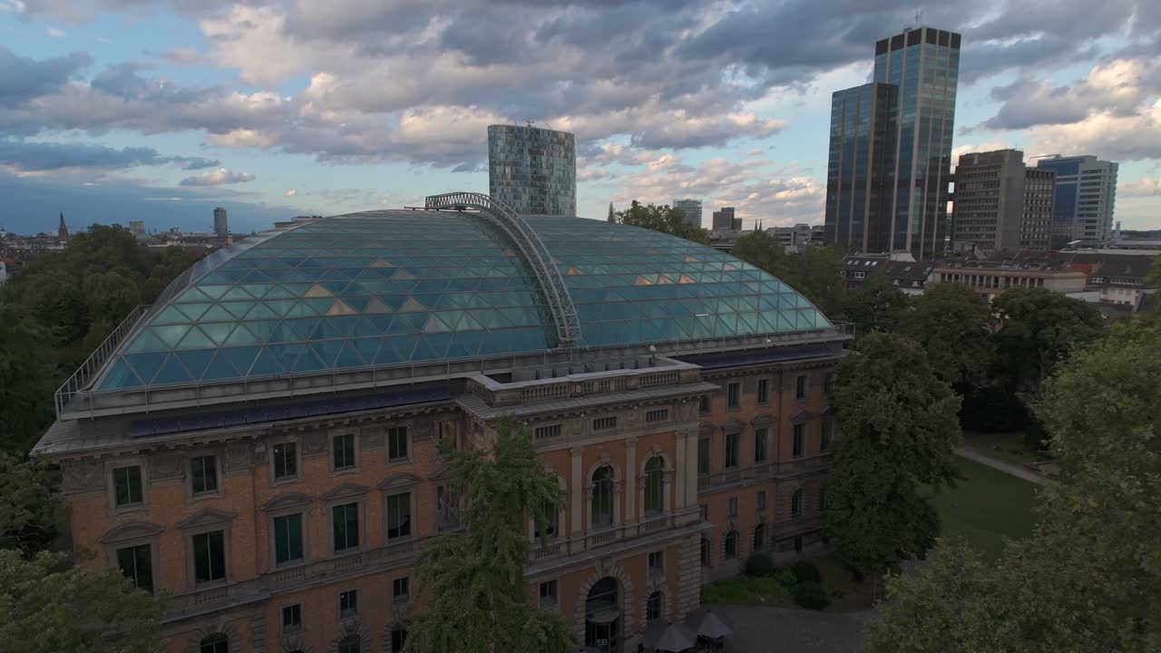 Aerial of K21art museum with a backdrop of the D&uuml;sseldorf cityscape