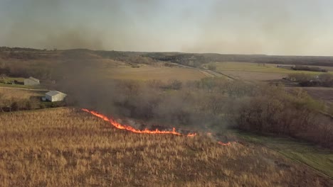 control burn near house homestead footage of field fire