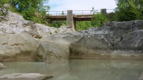 aerial dolly shot flying over a shallow section of the mirna river near hum, croatia