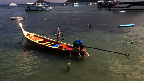 looking at small boat at the sea.