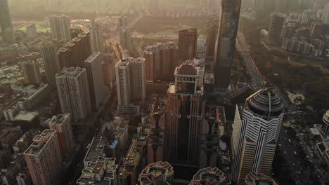 aerial establishing shot of shenzhen cityscape futian district at sunset