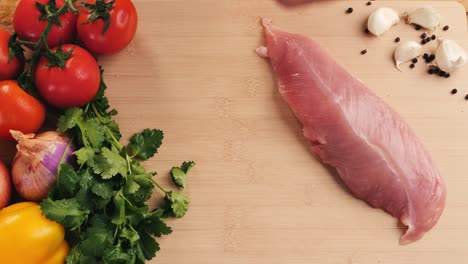 preparing turkey breast with vegetables