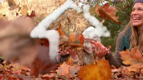 Familie-Wirft-Blätter-Im-Herbst