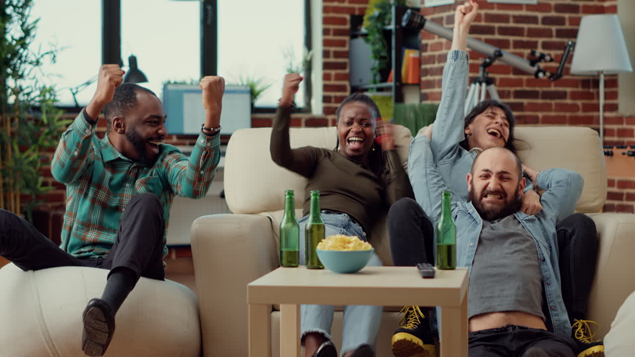 Group of soccer fans celebrating football match win