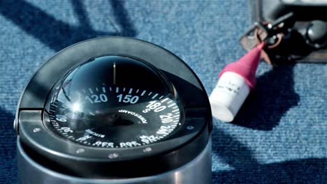 navigational compass on a boat showing degrees