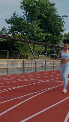 woman running on a track