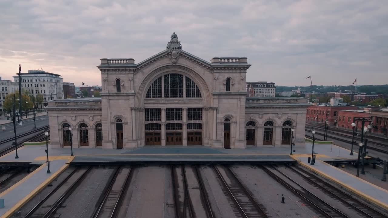 Architectural beauty of historic train station captured in three sequential frames, showcasing the evolving scene with dynamic angles and atmospheric lighting effects