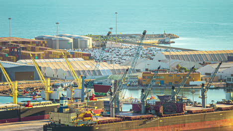 Time-lapse-of-cranes-unloading-cargo-from-a-large-boat-in-the-Port-of-Malaga,-Spain