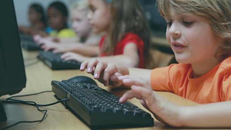 Animation of chemical icons over diverse schoolchildren using computers